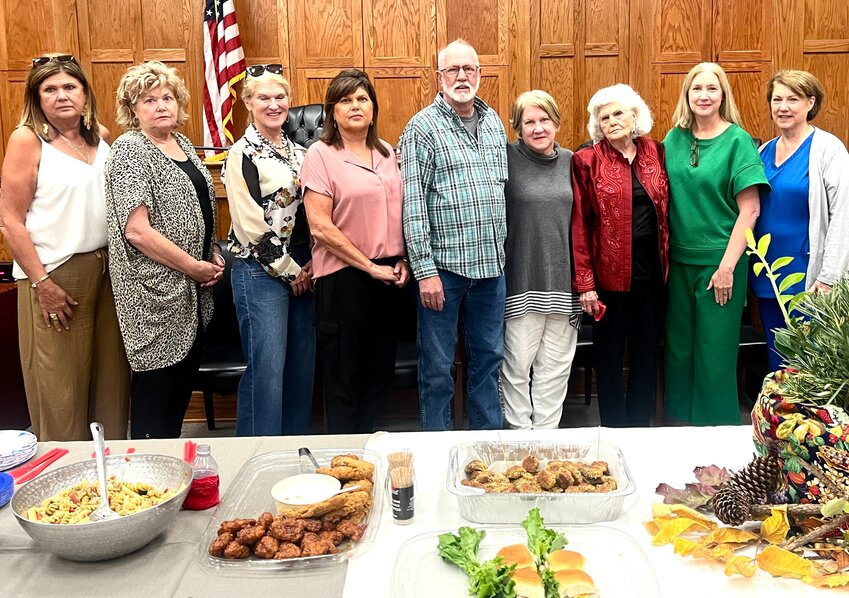 Lee will retire at the end of the year. She is joined by her family, from left, Pam Lee McCoy, Vicki Lee Burt, Missy Duncan Winstead, Kim Lee Duke, her husband James Lee, Lee, Ruby Lee, Christi Lee Gregory and Lucy Duncan Keith.